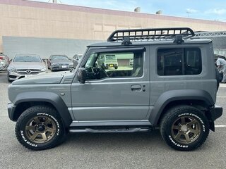 2023 Suzuki Jimny Sierra IV, серый, 1480000 рублей, вид 4
