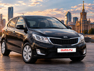 2013 Kia Rio 5-speed III, чёрный, 850000 рублей, вид 1