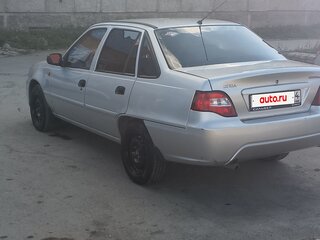 2012 Daewoo Nexia I Рестайлинг, серебристый, 295000 рублей, вид 3