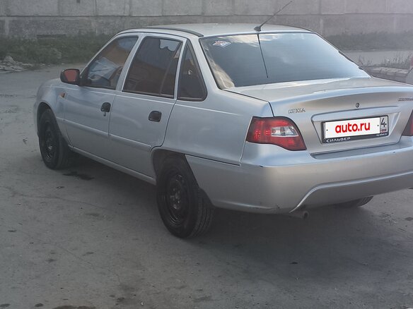 2012 Daewoo Nexia I Рестайлинг, серебристый, 295000 рублей - вид 2