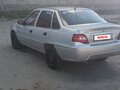 2012 Daewoo Nexia I Рестайлинг, серебристый, 295000 рублей - вид 2