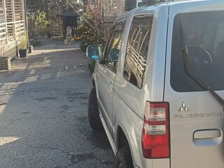 2010 Mitsubishi Pajero Mini II, серебристый, 670000 рублей, вид 5