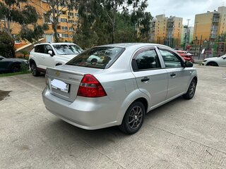 2010 Chevrolet Aveo I Рестайлинг, серебристый, 550000 рублей, вид 3