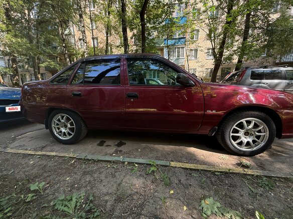 2012 Daewoo Nexia I Рестайлинг, пурпурный, 260000 рублей - вид 2