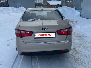 2014 Kia Rio 6-speed III, бежевый, 900000 рублей, вид 5