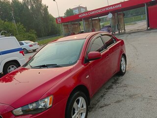 2007 Mitsubishi Lancer X, красный, 650000 рублей, вид 1
