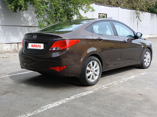 2016 Hyundai Solaris I Рестайлинг, коричневый, 940000 рублей, вид 5