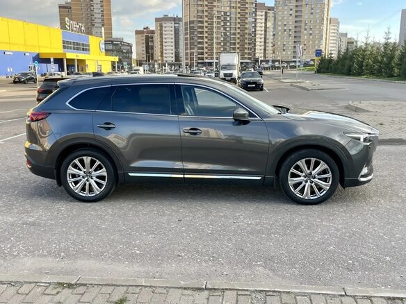 2022 Mazda CX-9 II Рестайлинг, серый, 4500000 рублей - вид 3