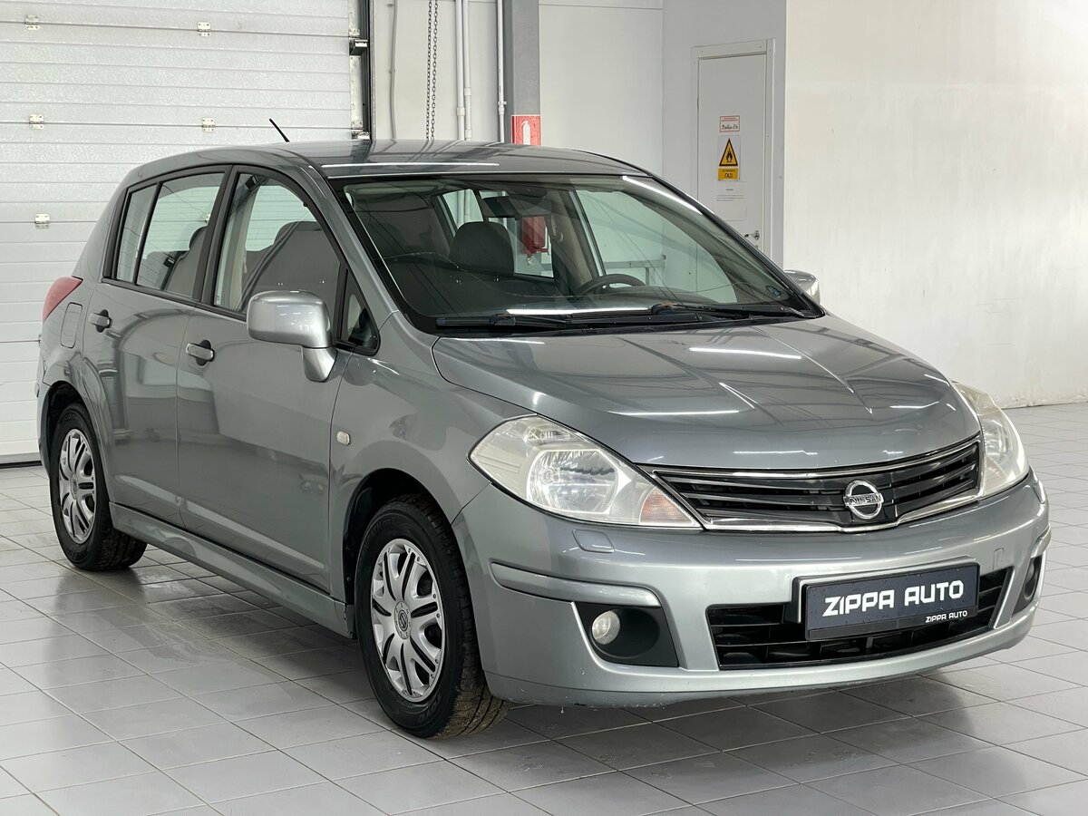 Открыть фотографии: Nissan Tiida I Рестайлинг