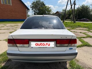 2000 Nissan Sunny B15, белый, 350000 рублей, вид 4