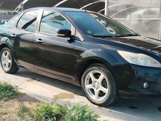2010 Ford Focus II Рестайлинг, чёрный, 450000 рублей, вид 3
