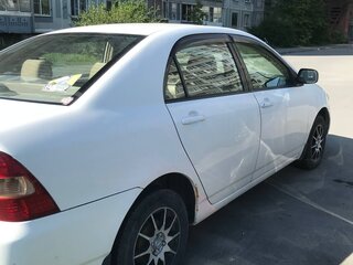 2001 Toyota Corolla IX (E120, E130), белый, 430000 рублей, вид 3
