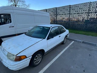 1994 Ford Escort (North America) II, белый, 130000 рублей, вид 2