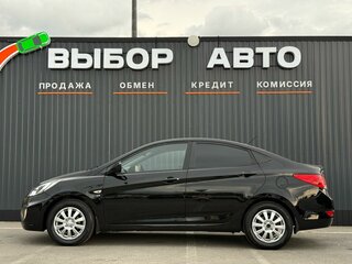 2011 Hyundai Solaris I, чёрный, 789000 рублей, вид 4