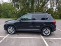 2014 Volkswagen Tiguan I Рестайлинг, чёрный - вид 2