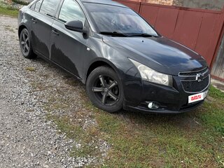 2010 Chevrolet Cruze I, чёрный, 460000 рублей, вид 1