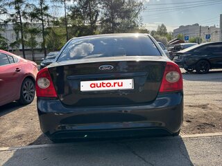 2010 Ford Focus II Рестайлинг, чёрный, 630000 рублей, вид 3