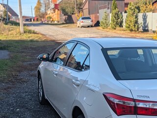 2014 Toyota Corolla XI (E160, E170, E180), белый, 1350000 рублей, вид 5