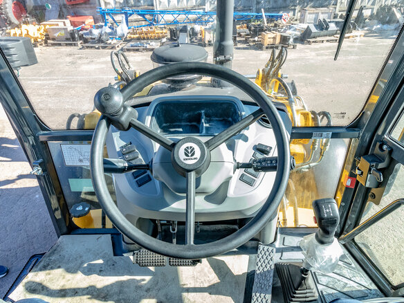2024 New Holland B110C, жёлтый - вид 8