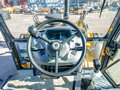 2024 New Holland B110C, жёлтый - вид 8