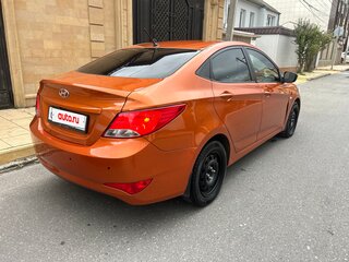 2015 Hyundai Solaris I Рестайлинг, оранжевый, 670000 рублей, вид 5