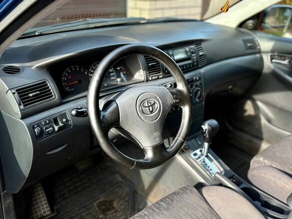 2003 Toyota Corolla IX (E120, E130), синий, 409999 рублей - вид 8