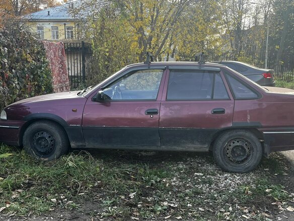 2005 Daewoo Nexia I, пурпурный, 100000 рублей - вид 4