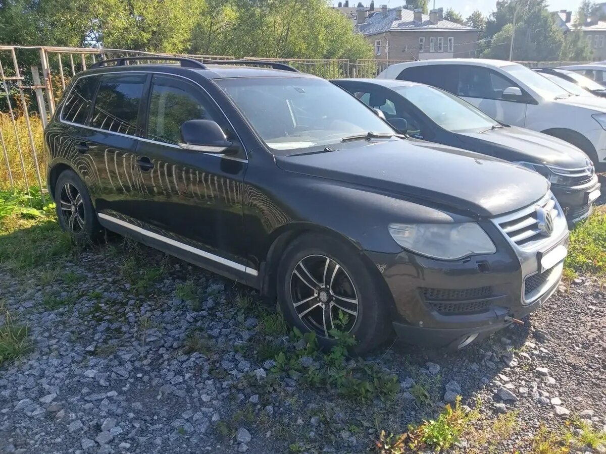 Открыть фотографии: Volkswagen Touareg I Рестайлинг