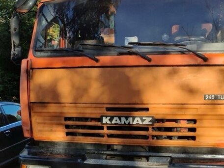 2013 КамАЗ 65115, оранжевый, 2000000 рублей, вид 1