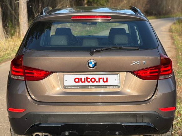 2013 BMW X1 20i I (E84) Рестайлинг, коричневый, 1495000 рублей - вид 5