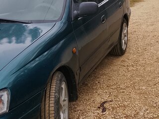 1994 Toyota Carina E, зелёный, 450000 рублей, вид 2