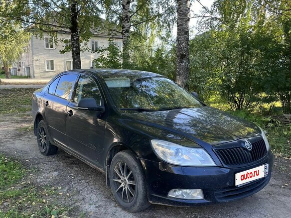 2012 Skoda Octavia II (A5) Рестайлинг, чёрный, 750000 рублей - вид 1