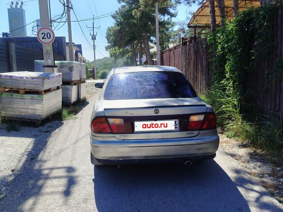 1997 Mazda 323 V (BA), серый, 150000 рублей - вид 8