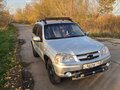 2013 Chevrolet Niva I Рестайлинг, серебристый, 630000 рублей - вид 2
