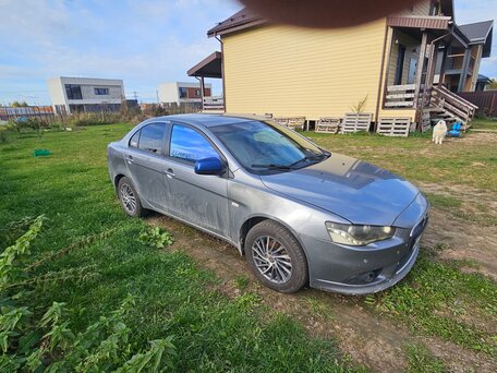 2012 Mitsubishi Lancer X Рестайлинг, серебристый, 650000 рублей, вид 2
