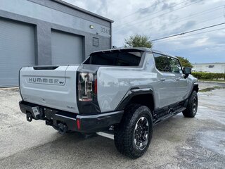 2024 GMC Hummer EV, серый, 18000000 рублей, вид 4