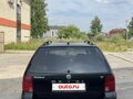 1998 Volkswagen Passat B5, чёрный - вид 1