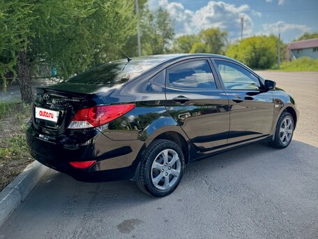 2011 Hyundai Solaris I, чёрный, 630000 рублей, вид 4