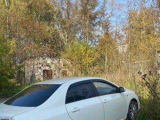2009 Toyota Corolla X (E140, E150), белый, 550000 рублей, вид 4
