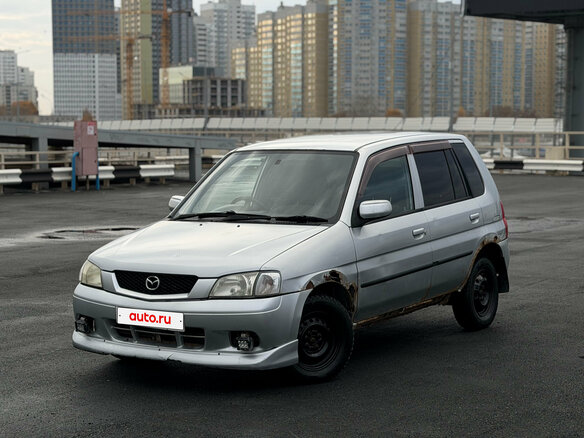 2001 Mazda Demio I (DW), серебристый, 109000 рублей