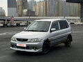 2001 Mazda Demio I (DW), серебристый, 109000 рублей