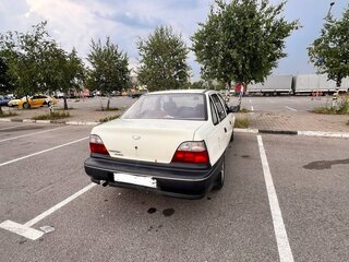 2002 Daewoo Nexia I, бежевый, 170000 рублей, вид 3