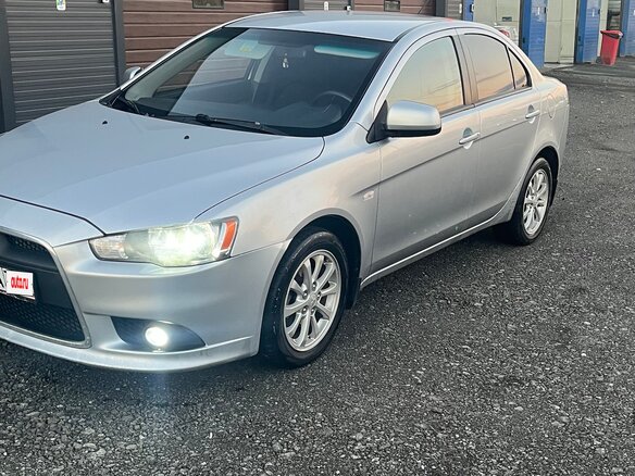 2012 Mitsubishi Lancer X Рестайлинг, серебристый, 720000 рублей - вид 7