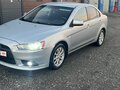 2012 Mitsubishi Lancer X Рестайлинг, серебристый, 720000 рублей - вид 7