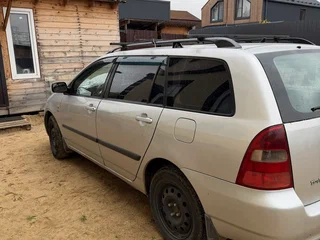 2004 Toyota Corolla IX (E120, E130), серебристый, 450000 рублей, вид 4