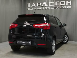 2013 Kia Rio 5-speed III, чёрный, 670000 рублей, вид 2