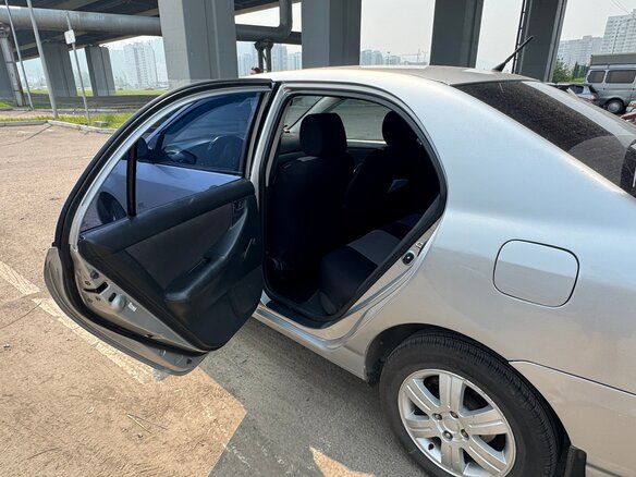 2004 Toyota Corolla IX (E120, E130), серебристый, 510000 рублей - вид 10
