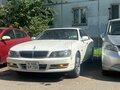 1997 Nissan Laurel VIII (C35), белый, 350000 рублей - вид 1