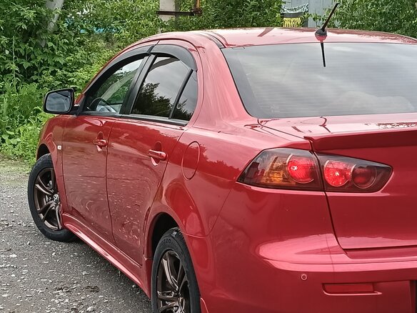 2008 Mitsubishi Lancer X, красный, 649000 рублей - вид 7
