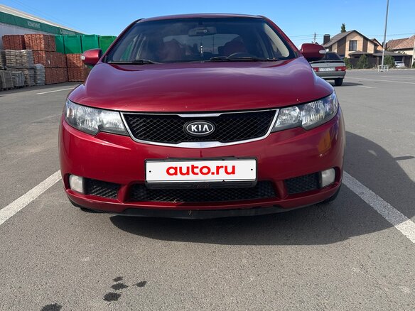 2010 Kia Cerato 5-speed II, красный, 830000 рублей - вид 1